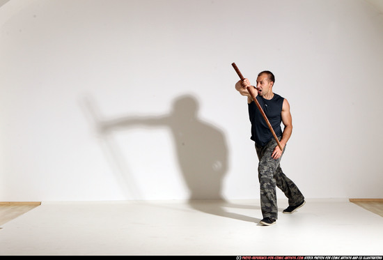 Man Adult Athletic White Fighting with sword Moving poses Casual