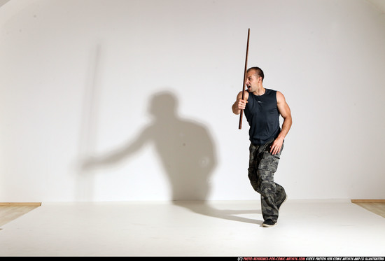 Man Adult Athletic White Fighting with sword Moving poses Casual