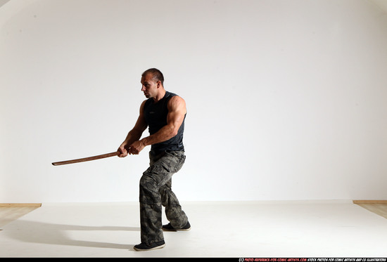 Man Adult Athletic White Fighting with sword Moving poses Casual