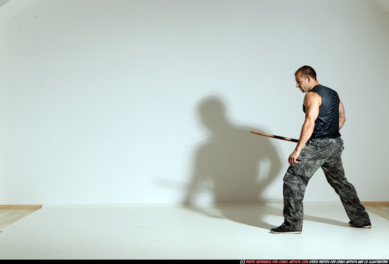 Man Adult Athletic White Fighting with sword Moving poses Casual