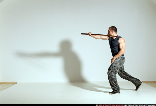 Man Adult Athletic White Fighting with sword Moving poses Casual