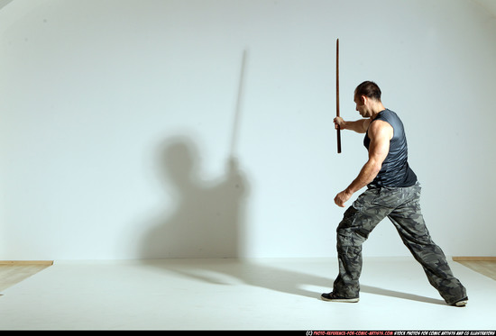 Man Adult Athletic White Fighting with sword Moving poses Casual