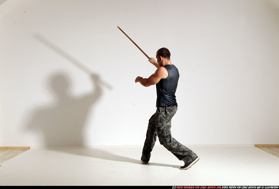 Man Adult Athletic White Fighting with sword Moving poses Casual