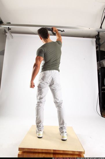 Man Adult Athletic White Fighting with submachine gun Standing poses Casual