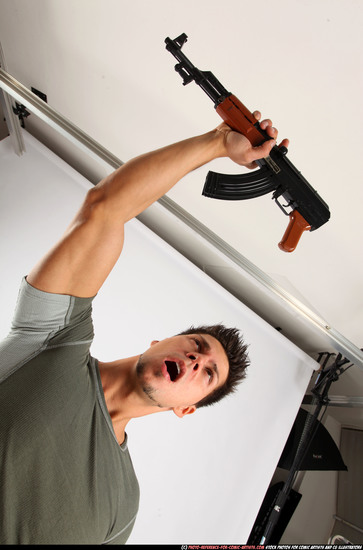 Man Adult Athletic White Fighting with submachine gun Standing poses Casual