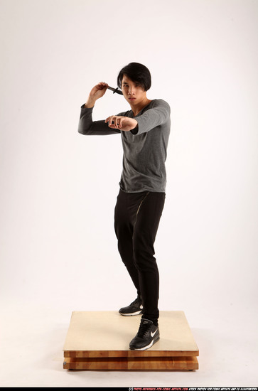 Man Young Athletic Fighting with knife Standing poses Casual Asian