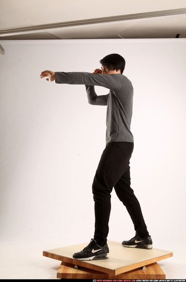 Man Young Athletic Fighting with knife Standing poses Casual Asian