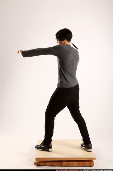 Man Young Athletic Fighting with knife Standing poses Casual Asian