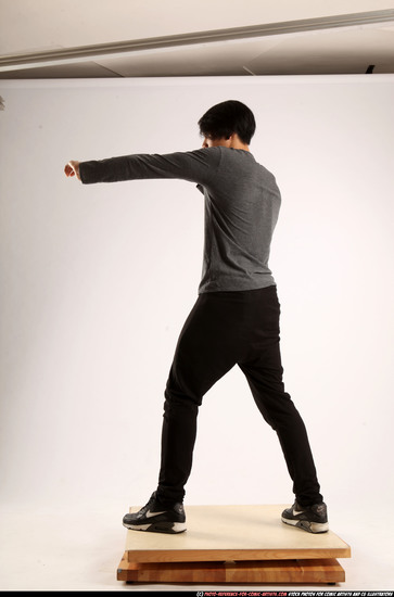 Man Young Athletic Fighting with knife Standing poses Casual Asian