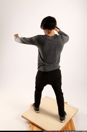 Man Young Athletic Fighting with knife Standing poses Casual Asian