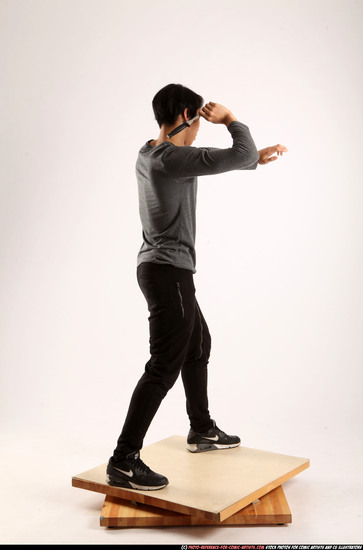 Man Young Athletic Fighting with knife Standing poses Casual Asian