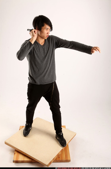 Man Young Athletic Fighting with knife Standing poses Casual Asian