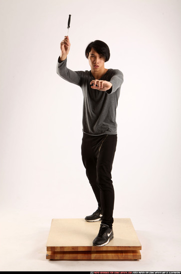 Man Young Athletic Fighting with knife Standing poses Casual Asian