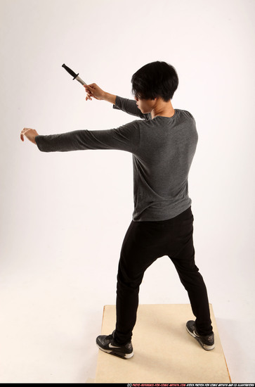 Man Young Athletic Fighting with knife Standing poses Casual Asian