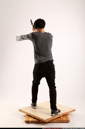 Man Young Athletic Fighting with knife Standing poses Casual Asian