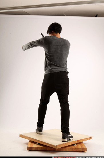 Man Young Athletic Fighting with knife Standing poses Casual Asian