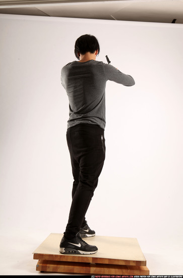 Man Young Athletic Fighting with knife Standing poses Casual Asian