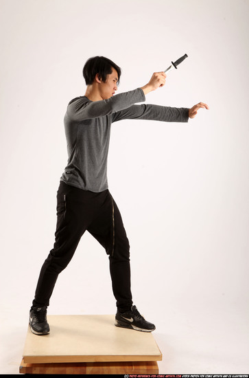 Man Young Athletic Fighting with knife Standing poses Casual Asian