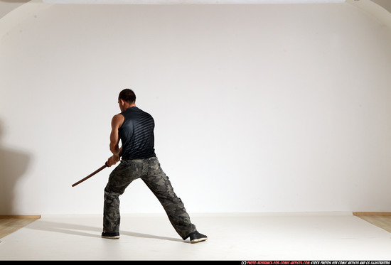 Man Adult Athletic White Fighting with sword Moving poses Casual