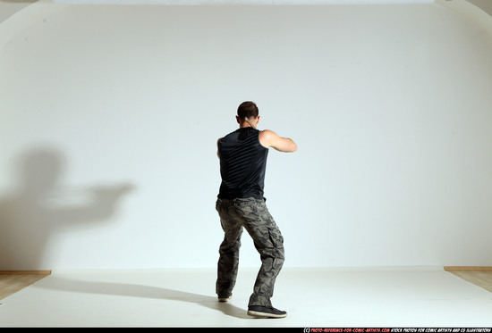 Man Adult Athletic White Fighting with sword Moving poses Casual