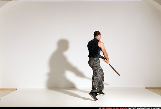 Man Adult Athletic White Fighting with sword Moving poses Casual