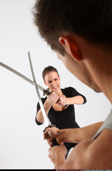 Man & Woman Adult Athletic White Fighting with sword Standing poses Casual