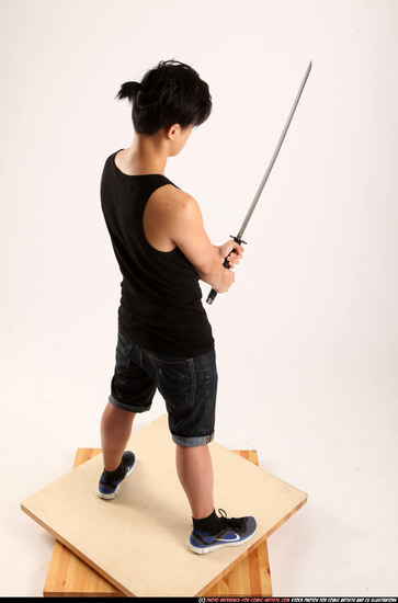 Man Young Athletic Fighting with sword Standing poses Casual Asian