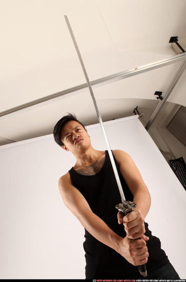 Man Young Athletic Fighting with sword Standing poses Casual Asian