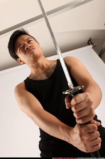 Man Young Athletic Fighting with sword Standing poses Casual Asian