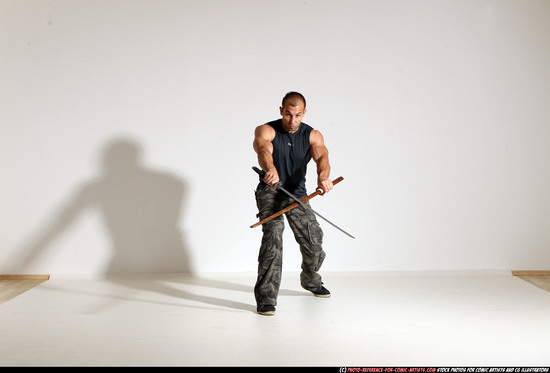 Man Adult Athletic White Fighting with sword Moving poses Casual