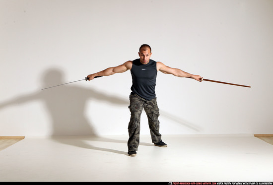 Man Adult Athletic White Fighting with sword Moving poses Casual