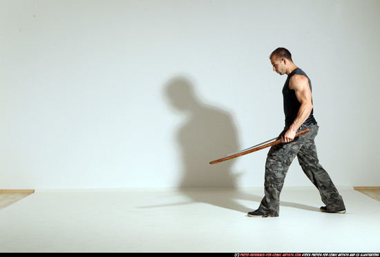 Man Adult Athletic White Fighting with sword Moving poses Casual