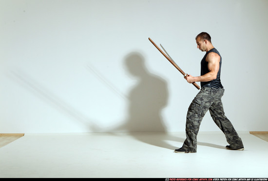 Man Adult Athletic White Fighting with sword Moving poses Casual