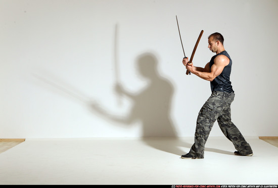 Man Adult Athletic White Fighting with sword Moving poses Casual