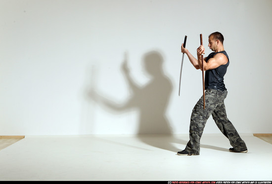 Man Adult Athletic White Fighting with sword Moving poses Casual