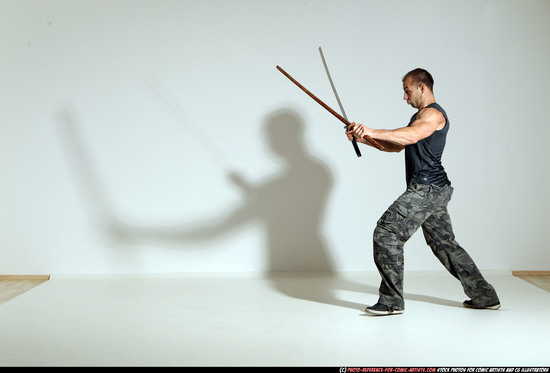 Man Adult Athletic White Fighting with sword Moving poses Casual