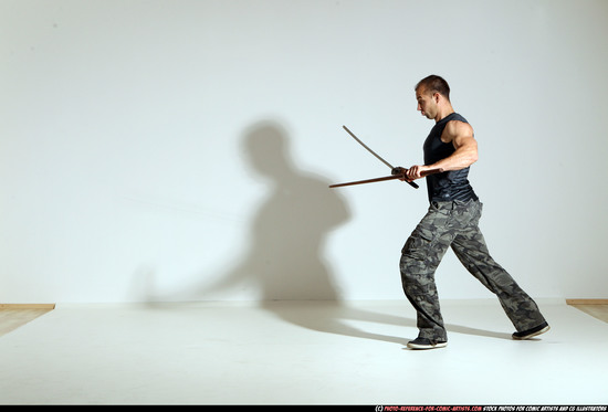 Man Adult Athletic White Fighting with sword Moving poses Casual