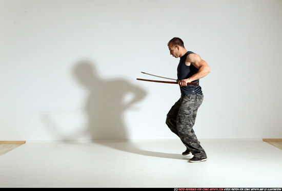 Man Adult Athletic White Fighting with sword Moving poses Casual