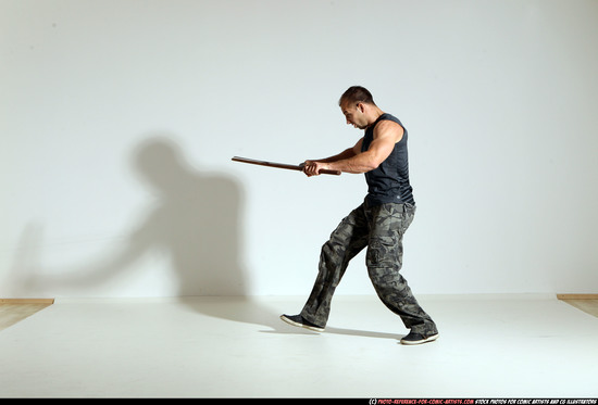 Man Adult Athletic White Fighting with sword Moving poses Casual