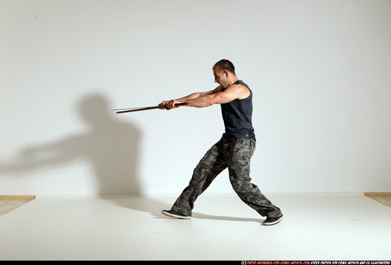 Man Adult Athletic White Fighting with sword Moving poses Casual