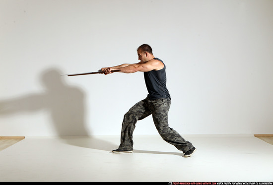 Man Adult Athletic White Fighting with sword Moving poses Casual