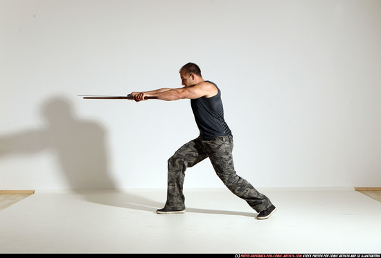 Man Adult Athletic White Fighting with sword Moving poses Casual