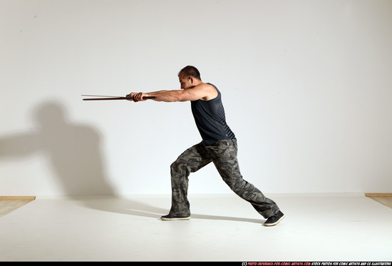 Man Adult Athletic White Fighting with sword Moving poses Casual