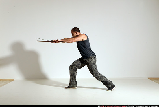 Man Adult Athletic White Fighting with sword Moving poses Casual