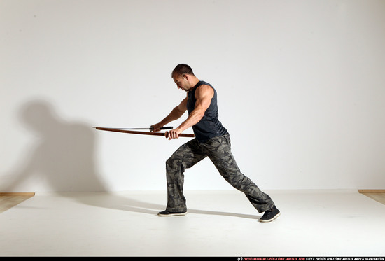 Man Adult Athletic White Fighting with sword Moving poses Casual