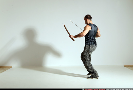 Man Adult Athletic White Fighting with sword Moving poses Casual