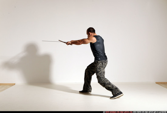 Man Adult Athletic White Fighting with sword Moving poses Casual