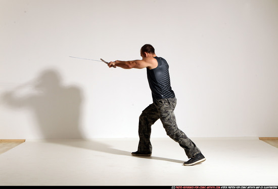 Man Adult Athletic White Fighting with sword Moving poses Casual