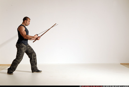 Man Adult Athletic White Fighting with sword Moving poses Casual