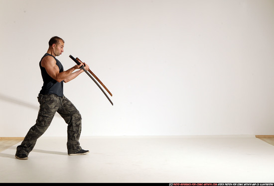 Man Adult Athletic White Fighting with sword Moving poses Casual